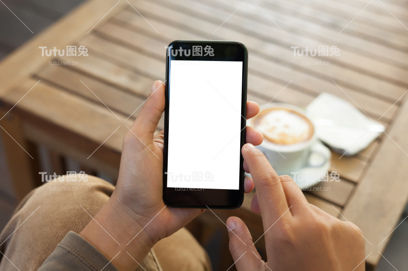 手持手机空白屏幕和手指触摸